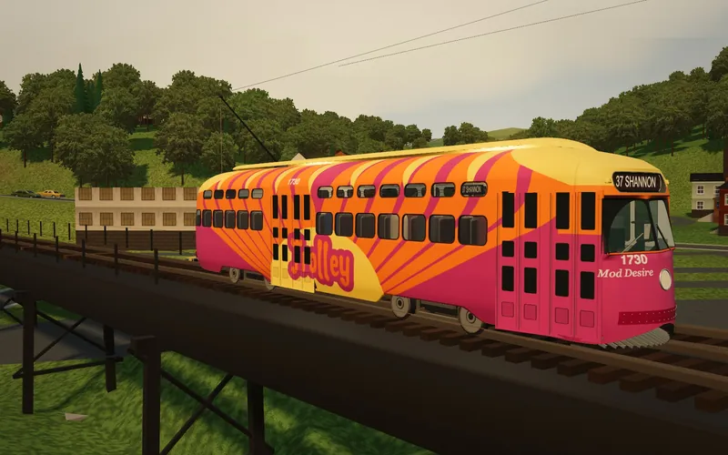PCC 1730, the Mod Desire, painted in pink, orange and yellow swirls