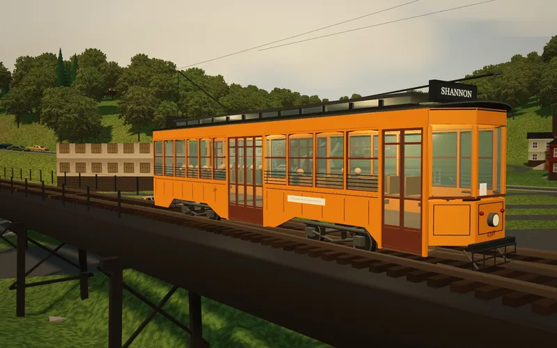 The orange Jones car, number 4398, an older wooden-style streetcar